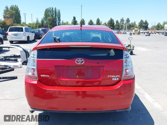 2007 Toyota Prius z VIN JTDKB20U373288946, wystawiony jako IAAI lot #42385536 z przebiegiem 133 336 mil mil oraz . Historia ofert i sprzedaży dostępna na DreamBid. Obrazek 16.