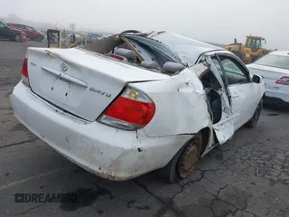 2005 Toyota Camry STD z VIN 4T1BE32K65U578545, wystawiony jako IAAI lot #41343321 z przebiegiem Nie podano mil oraz . Historia ofert i sprzedaży dostępna na DreamBid. Obrazek 4.