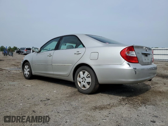 2004 Toyota Camry LE z VIN 4T1BE32K14U844858, wystawiony jako Copart lot #57564715 z przebiegiem 242 775 mil mil oraz Czysty tytuł • Clean title. Historia ofert i sprzedaży dostępna na DreamBid. Obrazek 2.