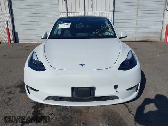 2023 Tesla Model Y Performance with VIN 7SAYGDEF3PF711497, listed as a IAAI auction lot 41877450 with 21,887 mi miles and . Bid and sale history available at DreamBid. Image 12.