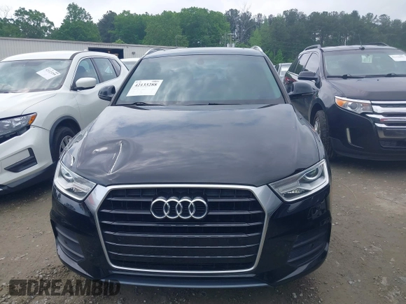 2016 Audi Q3 Premium Plus with VIN WA1BFCFSXGR022587, listed as a IAAI auction lot 42133288 with 141,609 mi miles. Bid and sale history available at carsss.com. Image 12.