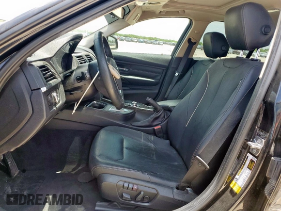 2013 BMW 3 Series 328i with VIN WBA3A5G55DNP21848, listed as a Copart auction lot 61733995 with 134,760 mi miles and Salvage title. Bid and sale history available at DreamBid. Image 7.