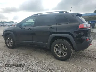 2019 Jeep Cherokee Trailhawk with VIN 1C4PJMBX9KD183116, listed as a Copart auction lot 58518265 with 124,258 mi miles and Salvage title. Bid and sale history available at DreamBid. Image 2.