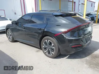 2023 Kia EV6 GT-Line with VIN KNDC44LA1P5115488, listed as a IAAI auction lot 41643754 with 26,494 mi miles. Bid and sale history available at carsss.com. Image 3.
