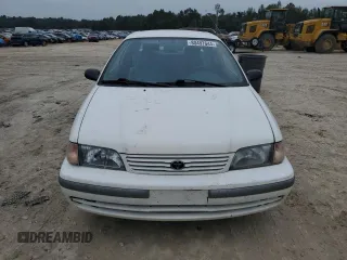 1998 Toyota Tercel DX z VIN JT2AC52L2W0307400, wystawiony jako Copart lot #80497644 z przebiegiem 72 167 mil mil oraz Czysty tytuł • Clean title. Historia ofert i sprzedaży dostępna na DreamBid. Obrazek 5.