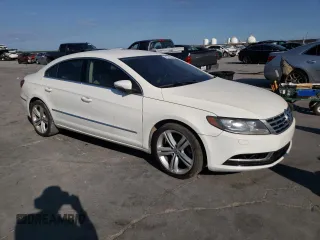 2013 Volkswagen CC R-Line with VIN WVWBP7AN9DE501078, listed as a Copart auction lot 74514284 with 96,694 mi miles and Salvage Title. Bid and sale history available at carsss.com. Image 4.