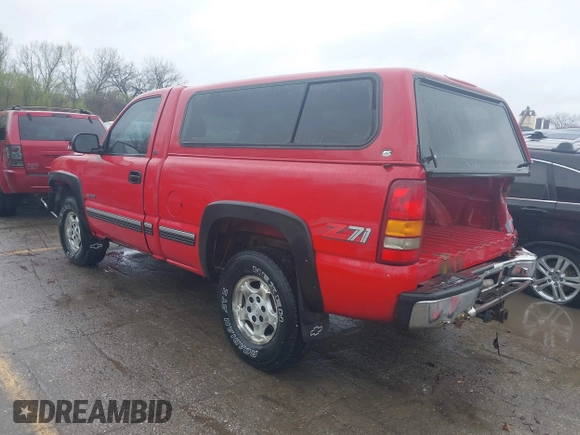 1999 Chevrolet Silverado 1500 LS with VIN 1GCEK14T6XZ153966, listed as a IAAI auction lot 41898476 with 246,792 mi miles. Bid and sale history available at carsss.com. Image 3.