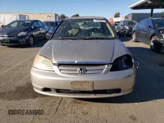 2001 Honda Civic LX with VIN 1HGES15561L022838, listed as a Copart auction lot 83866374 with 179,691 mi miles and Salvage Title. Bid and sale history available at DreamBid. Image 5.