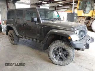 2017 Jeep Wrangler Unlimited Sahara with VIN 1C4BJWEG8HL638067, listed as a IAAI auction lot 41274352 with 57,339 mi miles. Bid and sale history available at carsss.com. Image 1.
