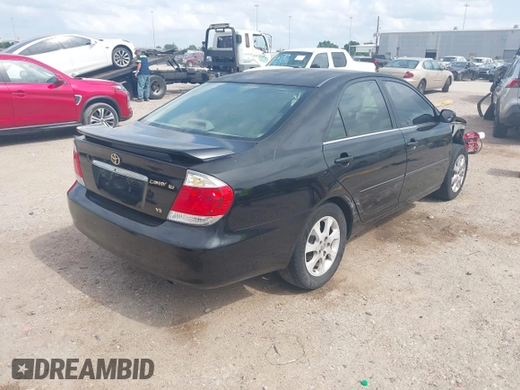 2005 Toyota Camry LE with VIN 4T1BF32K15U091945, listed as a IAAI auction lot 42124503 with 212,951 mi miles and . Bid and sale history available at DreamBid. Image 4.