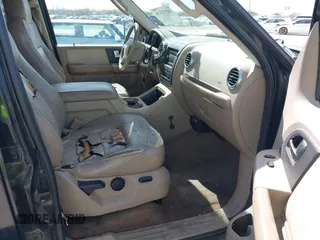 2004 Ford Expedition Eddie Bauer with VIN 1FMPU17L64LB37520, listed as a IAAI auction lot 41772378 with 305,126 mi miles. Bid and sale history available at carsss.com. Image 5.