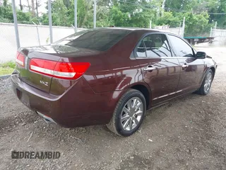 2012 Lincoln MKZ with VIN 3LNHL2GC1CR814230, listed as a IAAI auction lot 42503146 with 116,089 mi miles and . Bid and sale history available at DreamBid. Image 4.