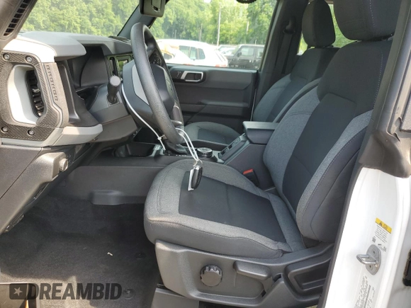 2021 Ford Bronco с VIN 1FMDE5DH7MLA97679, выставлен на аукционе Copart как лот 59857284 с пробегом 33 155 миль миль и Списание • Salvage title. История ставок и продаж доступна на DreamBid. Изображение 7.