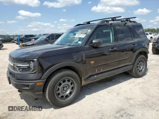 2021 Ford Bronco Sport Badlands z VIN 3FMCR9D99MRA07787, wystawiony jako Copart lot #56057315 z przebiegiem 57 401 mil mil oraz Szkoda całkowita • Salvage title. Historia ofert i sprzedaży dostępna na DreamBid. Obrazek 1.