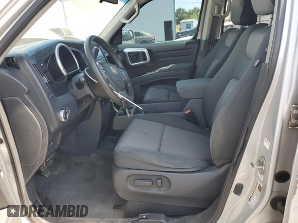 2006 Honda Ridgeline RTS z VIN 2HJYK16436H550371, wystawiony jako Copart lot #59504235 z przebiegiem 275 187 mil mil oraz Szkoda całkowita • Salvage title. Historia ofert i sprzedaży dostępna na DreamBid. Obrazek 7.