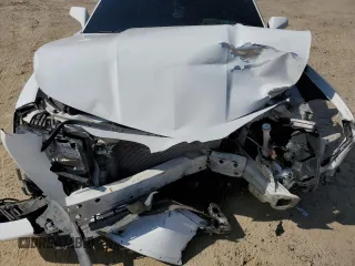2014 Chevrolet Camaro LT z VIN 2G1FC1E30E9289557, wystawiony jako Copart lot #59106785 z przebiegiem Nie podano mil oraz Szkoda całkowita • Salvage title. Historia ofert i sprzedaży dostępna na DreamBid. Obrazek 11.