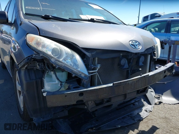 2012 Toyota Sienna with VIN 5TDZK3DC9CS261944, listed as a IAAI auction lot 41885359 with 184,918 mi miles. Bid and sale history available at carsss.com. Image 6.