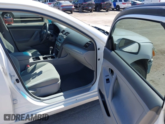 2007 Toyota Camry CE with VIN 4T1BE46K27U700563, listed as a IAAI auction lot 42080006 with 203,027 mi miles. Bid and sale history available at carsss.com. Image 5.
