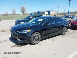 2017 Ford Fusion SE z VIN 3FA6P0HD1HR138693, wystawiony jako IAAI lot #41837634 z przebiegiem 117 638 mil mil oraz . Historia ofert i sprzedaży dostępna na DreamBid. Obrazek 17.