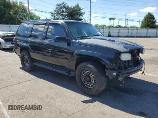 2000 GMC Denali z VIN 1GKEK13R4YR150964, wystawiony jako Copart lot #80484214 z przebiegiem 176 859 mil mil oraz Szkody całkowita. Historia ofert i sprzedaży dostępna na DreamBid. Obrazek 4.