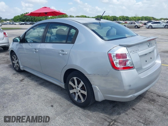 2012 Nissan Sentra S z VIN 3N1AB6AP7CL657434, wystawiony jako IAAI lot #42728376 z przebiegiem 150 930 mil mil oraz . Historia ofert i sprzedaży dostępna na DreamBid. Obrazek 3.