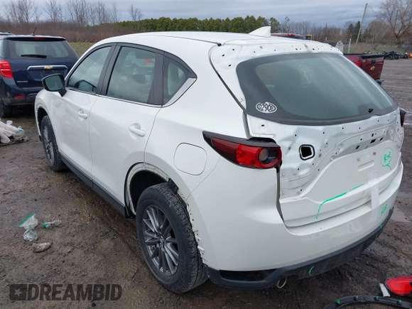 2019 Mazda CX-5 Sport with VIN JM3KFBBM2K0629966, listed as a IAAI auction lot 41953702 with 48,496 mi miles and . Bid and sale history available at DreamBid. Image 3.