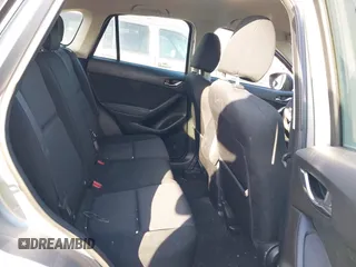 2014 Mazda CX-5 Sport with VIN JM3KE2BE9E0330345, listed as a IAAI auction lot 41377335 with 103,340 mi miles and . Bid and sale history available at carsss.com. Image 8.