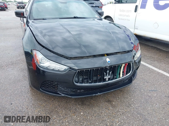 2014 Maserati Ghibli z VIN ZAM57XSA7E1091443, wystawiony jako IAAI lot #42163436 z przebiegiem 76 762 mil mil oraz . Historia ofert i sprzedaży dostępna na DreamBid. Obrazek 6.