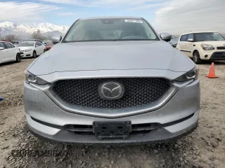 2021 Mazda CX-5 Touring with VIN JM3KFACM9M0409414, listed as a Copart auction lot 89071495 with 43,896 mi miles and Salvage Title. Bid and sale history available at carsss.com. Image 5.