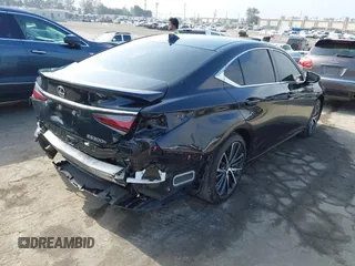 2024 Lexus ES 300h with VIN 58ADA1C14RU037328, listed as a IAAI auction lot 42334595 with 62,858 mi miles and . Bid and sale history available at DreamBid. Image 4.