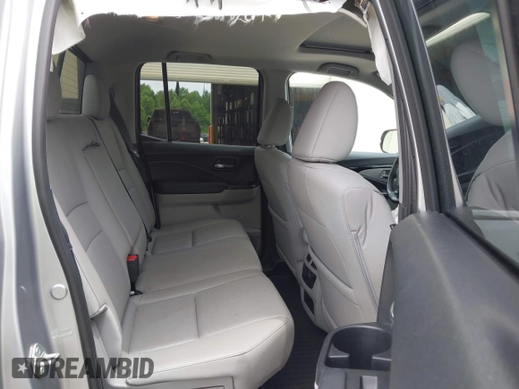 2019 Honda Ridgeline RTL-E with VIN 5FPYK3F75KB019660, listed as a IAAI auction lot 42548495 with 55,969 mi miles and . Bid and sale history available at DreamBid. Image 8.