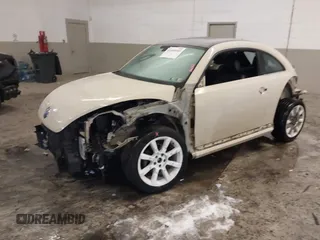 2019 Volkswagen Beetle S with VIN 3VWFD7ATXKM705322, listed as a IAAI auction lot 41409600 with 97,479 mi miles. Bid and sale history available at carsss.com. Image 18.