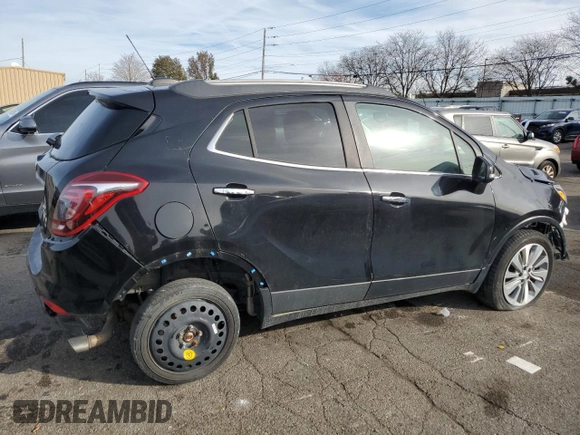 2020 Buick Encore Essence z VIN KL4CJGSB1LB044402, wystawiony jako Copart lot #78628684 z przebiegiem 64 651 mil mil oraz Szkody całkowita. Historia ofert i sprzedaży dostępna na DreamBid. Obrazek 3.