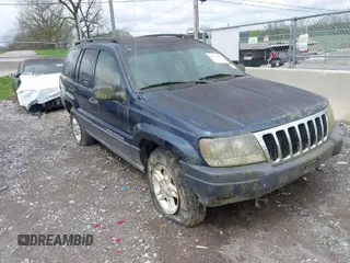 2003 Jeep Grand Cherokee Laredo z VIN 1J4GW48S63C591605, wystawiony jako IAAI lot #41973681 z przebiegiem 177 024 mil mil oraz . Historia ofert i sprzedaży dostępna na DreamBid. Obrazek 1.