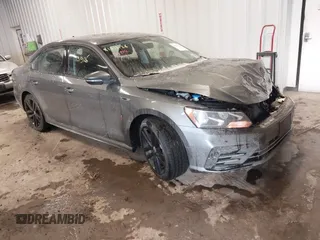 2018 Volkswagen Passat S z VIN 1VWAA7A31JC031628, wystawiony jako IAAI lot #41313126 z przebiegiem 73 863 mil mil oraz . Historia ofert i sprzedaży dostępna na DreamBid. Obrazek 1.