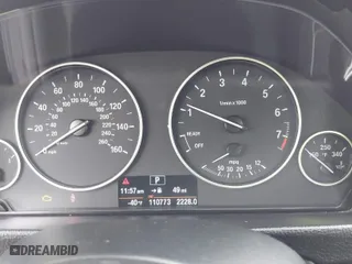 2014 BMW 3 Series 328i xDrive with VIN WBA3B5G57ENS06980, listed as a IAAI auction lot 42027714 with 110,773 mi miles. Bid and sale history available at carsss.com. Image 7.