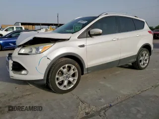 2014 Ford Escape Titanium с VIN 1FMCU0J90EUD24317, выставлен на аукционе Copart как лот 56580365 с пробегом 173 273 миль миль и Списание • Salvage title. История ставок и продаж доступна на DreamBid. Изображение 1.