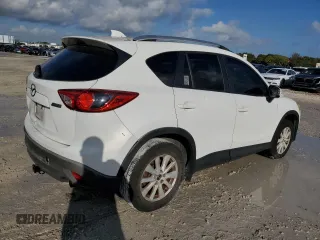 2014 Mazda CX-5 Sport with VIN JM3KE2BE5E0346882, listed as a Copart auction lot 45426995 with 209,435 mi miles and Clean Title. Bid and sale history available at carsss.com. Image 3.