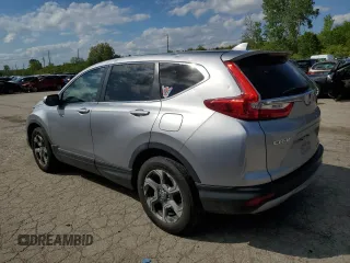 2017 Honda CR-V EX-L with VIN 5J6RW2H84HL015150, listed as a Copart auction lot 52027454 with 121,533 mi miles and Salvage Title. Bid and sale history available at carsss.com. Image 2.
