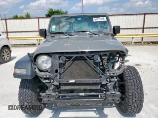 2020 Jeep Wrangler Unlimited Sport S with VIN 1C4HJXDN0LW276906, listed as a Copart auction lot 61099705 with 103,873 mi miles and Salvage title. Bid and sale history available at DreamBid. Image 5.