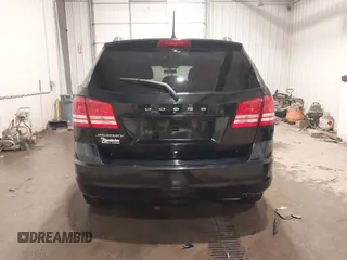 2017 Dodge Journey SE z VIN 3C4PDCAB4HT695490, wystawiony jako IAAI lot #41301719 z przebiegiem 103 642 mil mil oraz . Historia ofert i sprzedaży dostępna na DreamBid. Obrazek 17.