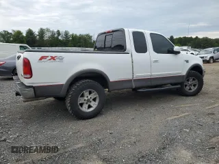 2003 Ford F-150 XL z VIN 2FTRX18L93CA55860, wystawiony jako Copart lot #57402295 z przebiegiem 312 879 mil mil oraz Szkoda całkowita • Salvage title. Historia ofert i sprzedaży dostępna na DreamBid. Obrazek 3.