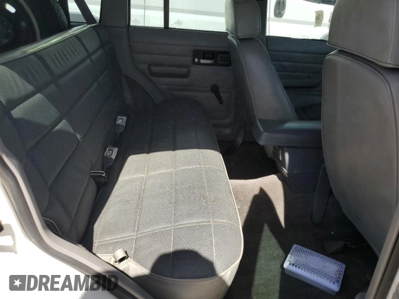 1994 Jeep Cherokee SE with VIN 1J4FT28SXRL151422, listed as a Copart auction lot 77358594 with 74,628 mi miles and Salvage Title. Bid and sale history available at carsss.com. Image 10.