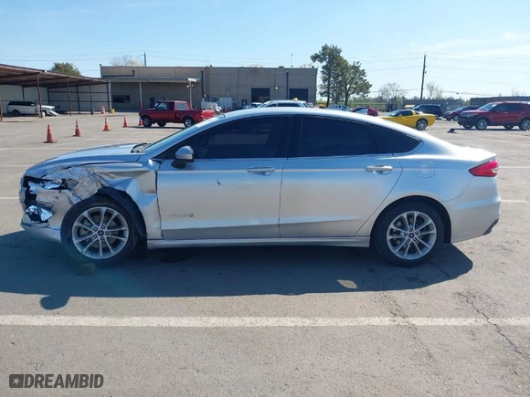 2019 Ford Fusion Hybrid SE with VIN 3FA6P0LU2KR188503, listed as a IAAI auction lot 41846755 with 67,906 mi miles. Bid and sale history available at carsss.com. Image 14.
