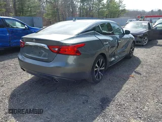 2017 Nissan Maxima SV z VIN 1N4AA6AP2HC443024, wystawiony jako IAAI lot #41792085 z przebiegiem 138 285 mil mil oraz . Historia ofert i sprzedaży dostępna na DreamBid. Obrazek 4.