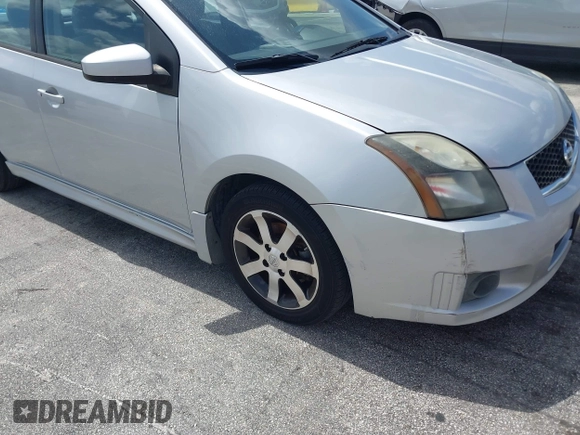 2012 Nissan Sentra S z VIN 3N1AB6AP7CL657434, wystawiony jako IAAI lot #42728376 z przebiegiem 150 930 mil mil oraz . Historia ofert i sprzedaży dostępna na DreamBid. Obrazek 6.