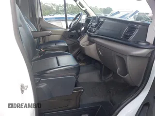 2020 Ford Transit Cargo z VIN 1FTBR1C8XLKB52205, wystawiony jako IAAI lot #42514128 z przebiegiem 103 583 mil mil oraz . Historia ofert i sprzedaży dostępna na DreamBid. Obrazek 5.