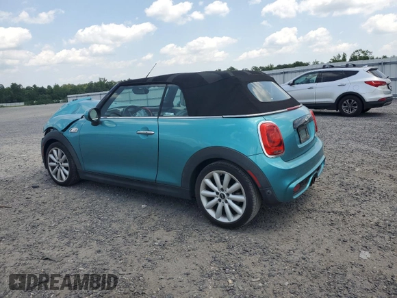 2018 MINI Convertible Cooper S with VIN WMWWG9C59J3D22587, listed as a Copart auction lot 61673415 with 34,935 mi miles and Salvage title. Bid and sale history available at DreamBid. Image 2.