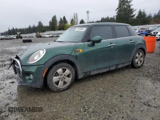 2016 MINI Hardtop 4 Door with VIN WMWXU1C58G2D12212, listed as a Copart auction lot 52359855 with 125,283 mi miles and Salvage Title. Bid and sale history available at DreamBid. Image 1.