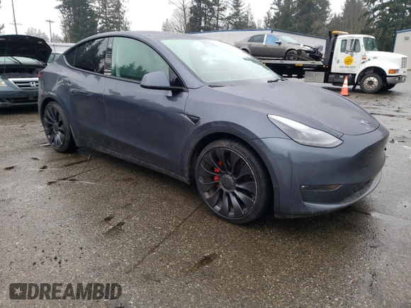2022 Tesla Model Y Performance with VIN 7SAYGDEF2NF459268, listed as a Copart auction lot 45764735 with 64,421 mi miles and Salvage title. Bid and sale history available at DreamBid. Image 4.